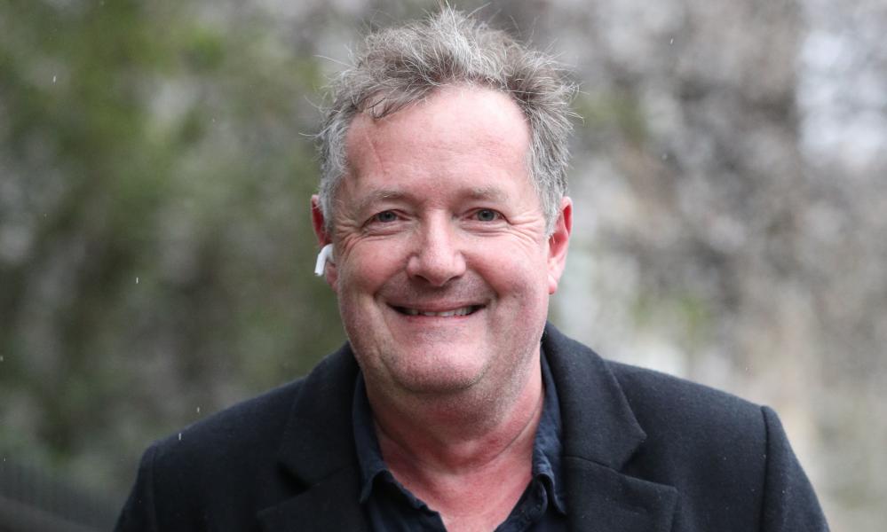 穿西装打领带的皮尔斯·摩根（Piers Morgan）对着镜头微笑：照片：乔纳森·布雷迪（Jonathan Brady）/ PA